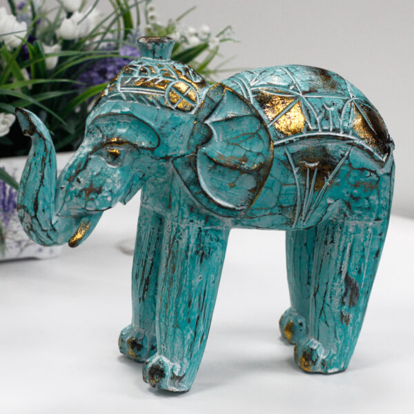 Second image of Elefante Tallado en Madera - Oro Turquesa